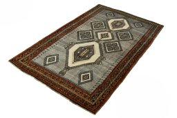 Corner detail of 2000s Shiraz rug showing border pattern and Wool pile