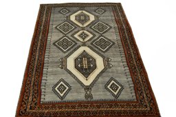 Surface texture of 2000s Shiraz rug with natural Wool and intricate pattern