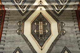 Full view of 2000s Shiraz rug from Iran / Persia, 248 × 150 cm in Beige tones