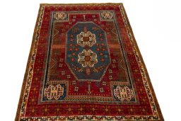 Surface texture of 2000s Shiraz rug with natural Wool and intricate pattern