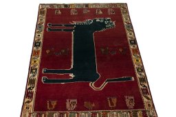 Surface texture of 2000s Shiraz rug with natural Wool and intricate pattern