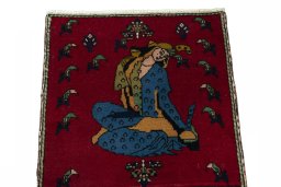 Surface texture of 2000s Shiraz rug with natural Wool and intricate pattern