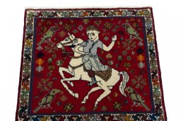 Surface texture of 2000s Shiraz rug with natural Wool and intricate pattern