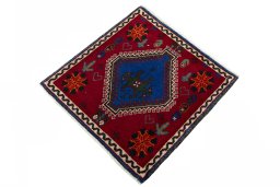 Corner detail of 2000s Shiraz rug showing border pattern and Wool pile