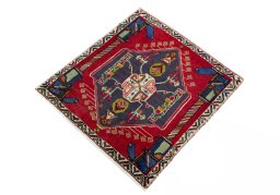 Corner detail of 2000s Shiraz rug showing border pattern and Wool pile