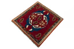 Corner detail of 2000s Shiraz rug showing border pattern and Wool pile