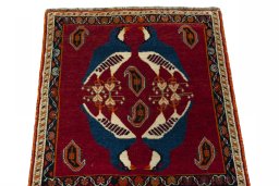 Surface texture of 2000s Shiraz rug with natural Wool and intricate pattern