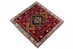Corner detail of 2000s Shiraz rug showing border pattern and Wool pile