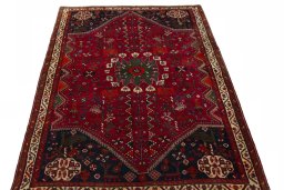 Surface texture of 2000s Shiraz rug with natural Wool and intricate pattern
