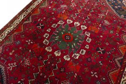 Backside of handmade 2000s Shiraz rug showing knot structure and weave density
