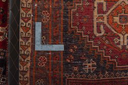 Surface texture of 2000s Shiraz rug with natural Wool and intricate pattern