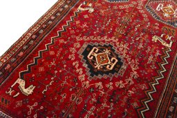 Backside of handmade 2000s Shiraz rug showing knot structure and weave density