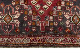 Close-up detail of 2000s Shiraz rug from Iran / Persia showing Wool weave