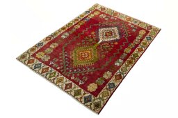 Corner detail of 2000s Shiraz rug showing border pattern and Wool pile