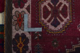 Surface texture of 2000s Shiraz rug with natural Wool and intricate pattern