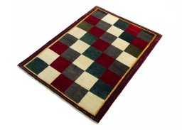Corner detail of 2000s Shiraz rug showing border pattern and Wool pile