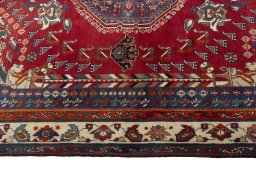 Corner detail of 1970s Shiraz rug showing border pattern and Wool pile