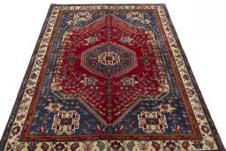 Surface texture of 1970s Shiraz rug with natural Wool and intricate pattern