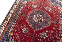 Backside of handmade 1970s Shiraz rug showing knot structure and weave density