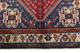 Full view of 1970s Shiraz rug from Iran / Persia, 250 × 162 cm in Red tones