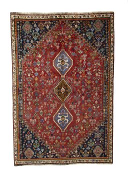 Full view of 1970s Shiraz rug from Iran / Persia, 270 × 180 cm in Red tones