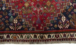 Close-up detail of 1970s Shiraz rug from Iran / Persia showing Wool weave