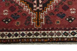 Central medallion detail of 2000s Shiraz rug from Iran / Persia