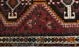Close-up detail of 2000s Shiraz rug from Iran / Persia showing Wool weave
