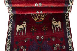 Corner detail of 2000s Shiraz rug showing border pattern and Wool pile