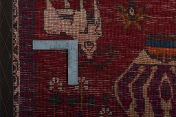 Surface texture of 2000s Shiraz rug with natural Wool and intricate pattern