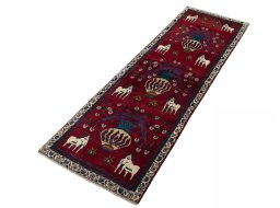 Corner detail of 2000s Shiraz rug showing border pattern and Wool pile