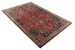 Close-up detail of 2000s Shiraz rug from Iran / Persia showing Wool weave
