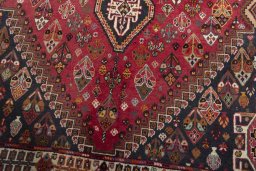 Central medallion detail of 2000s Shiraz rug from Iran / Persia