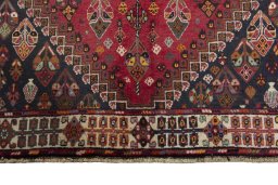 Close-up detail of 2000s Shiraz rug from Iran / Persia showing Wool weave