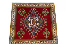 Surface texture of 2000s Shiraz rug with natural Wool and intricate pattern