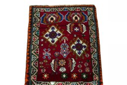 Surface texture of 2000s Shiraz rug with natural Wool and intricate pattern