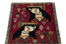 Surface texture of 2000s Shiraz rug with natural Wool and intricate pattern