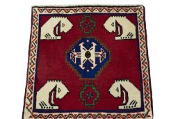 Surface texture of 2000s Shiraz rug with natural Wool and intricate pattern