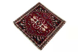 Corner detail of 2000s Shiraz rug showing border pattern and Wool pile