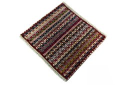 Corner detail of 2000s Shiraz rug showing border pattern and Wool pile