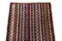 Surface texture of 2000s Shiraz rug with natural Wool and intricate pattern