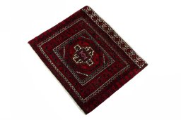 Corner detail of 2000s Shiraz rug showing border pattern and Wool pile