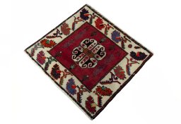 Corner detail of 2000s Shiraz rug showing border pattern and Wool pile