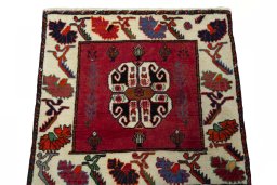 Surface texture of 2000s Shiraz rug with natural Wool and intricate pattern