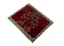 Corner detail of 2000s Shiraz rug showing border pattern and Wool pile