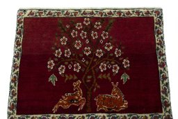 Surface texture of 2000s Shiraz rug with natural Wool and intricate pattern