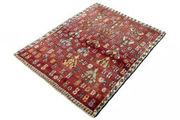 Corner detail of 2000s Shiraz rug showing border pattern and Wool pile