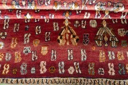 Full view of 2000s Shiraz rug from Iran / Persia, 153 × 118 cm in Red tones