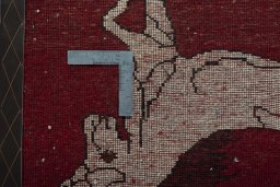 Backside of handmade 2000s Shiraz rug showing knot structure and weave density