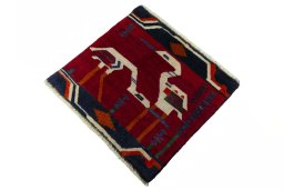 Corner detail of 2000s Shiraz rug showing border pattern and Wool pile